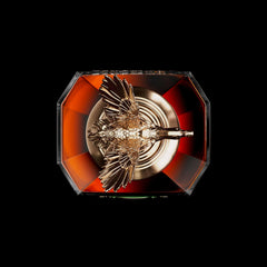 Ducks Unlimited logo overlaying a bottle of premium Kentucky Bourbon celebrating conservation efforts.